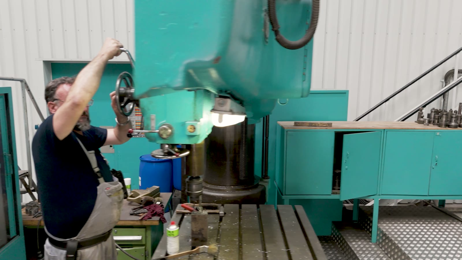 Still from the refit stand film, a machinist at work in the Lürssen yard